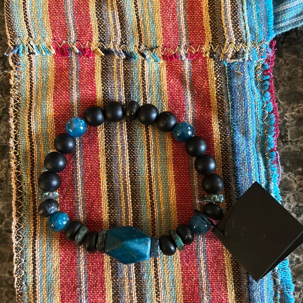 Hand-made semi-precious gemstone bracelet. Matte onyx & blue apatite.